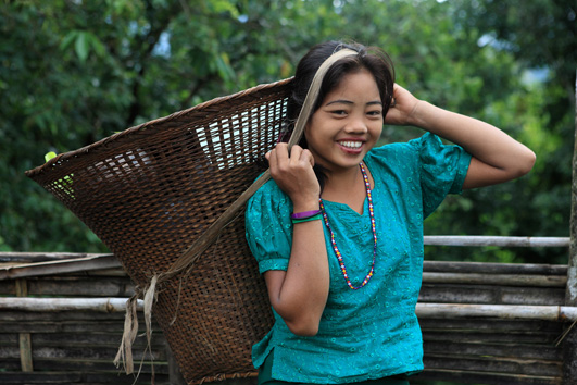 Muroung girl holding a basket